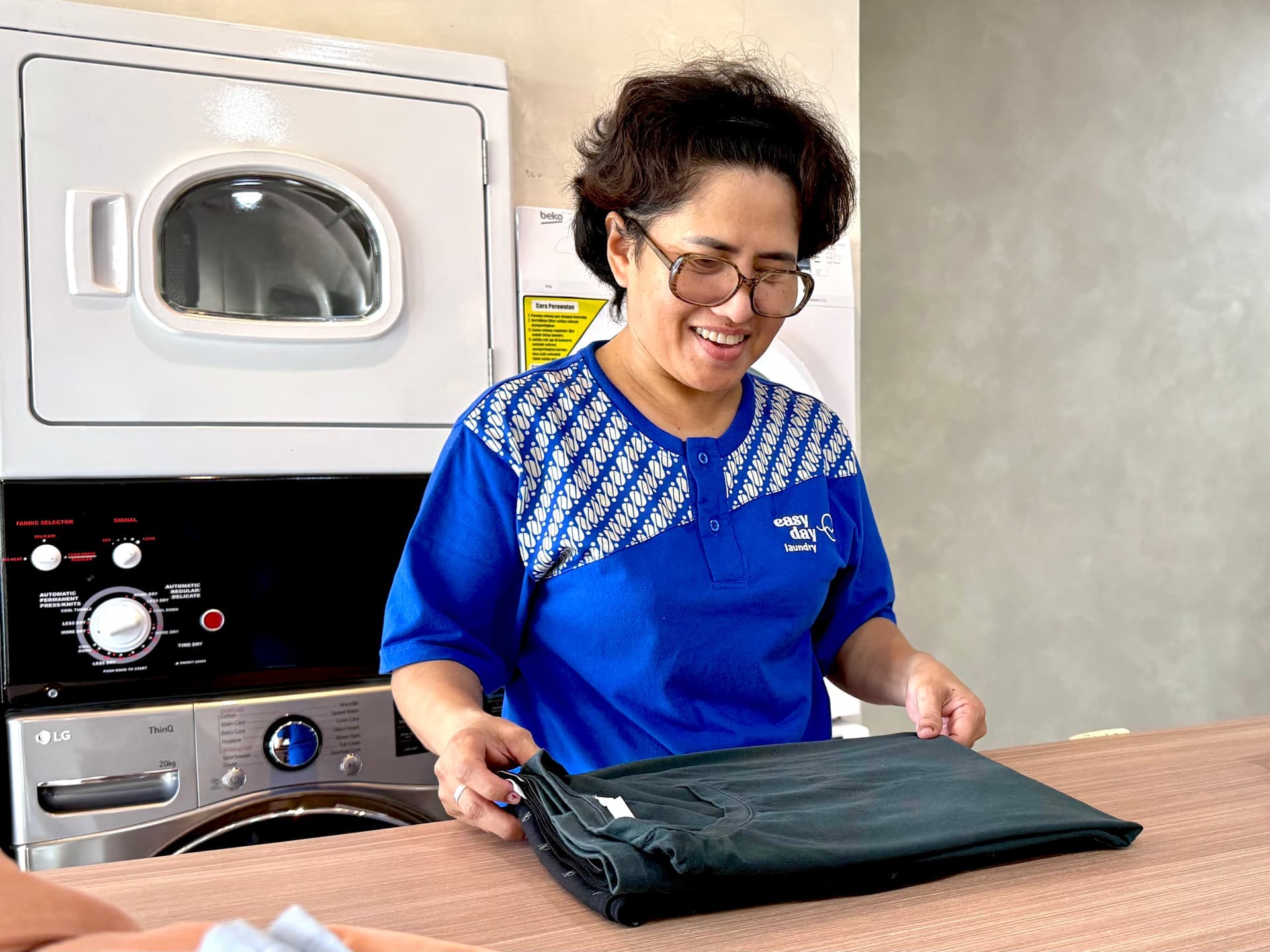 Fresh folded laundry by Easy Day Laundry